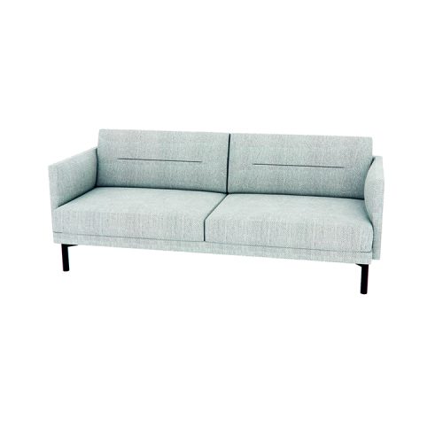 A light blue couch elegantly positioned in a cozy living room setting.