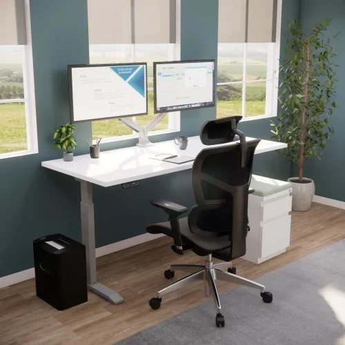 Height Adjustable Desk with ergonomic seating in home office